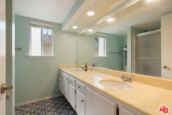 a view of a patio with a table chairs and a patio