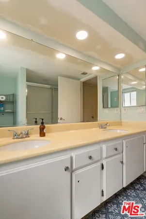 a view of a balcony with yard