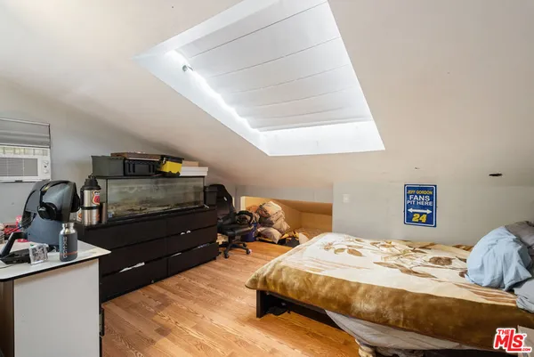 a view of street from balcony