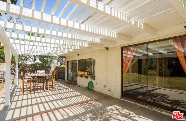 a view of a yard with trees