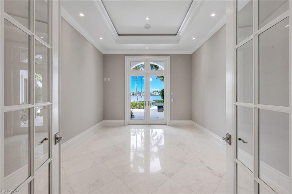 970 Aqua Circle Naples, FL 34102 - Photo 26 of 43 a view of entryway with wooden floor