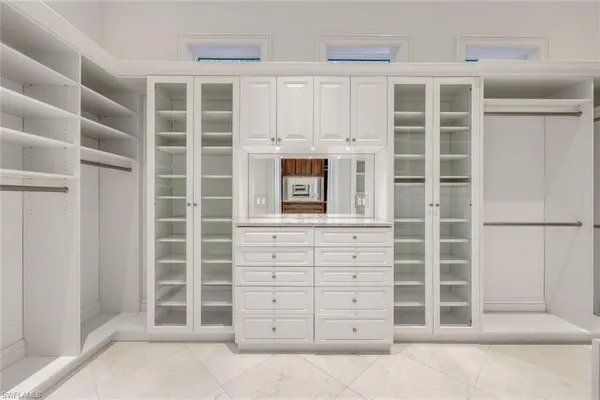 a view of entryway and hall with a view of bedroom