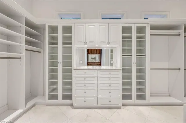 a view of entryway and hall with a view of bedroom