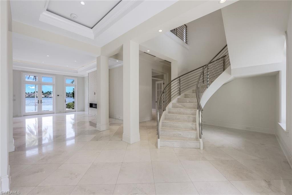 970 Aqua Circle Naples, FL 34102 - Photo 30 of 43 a view of entryway and hall with a view of bedroom