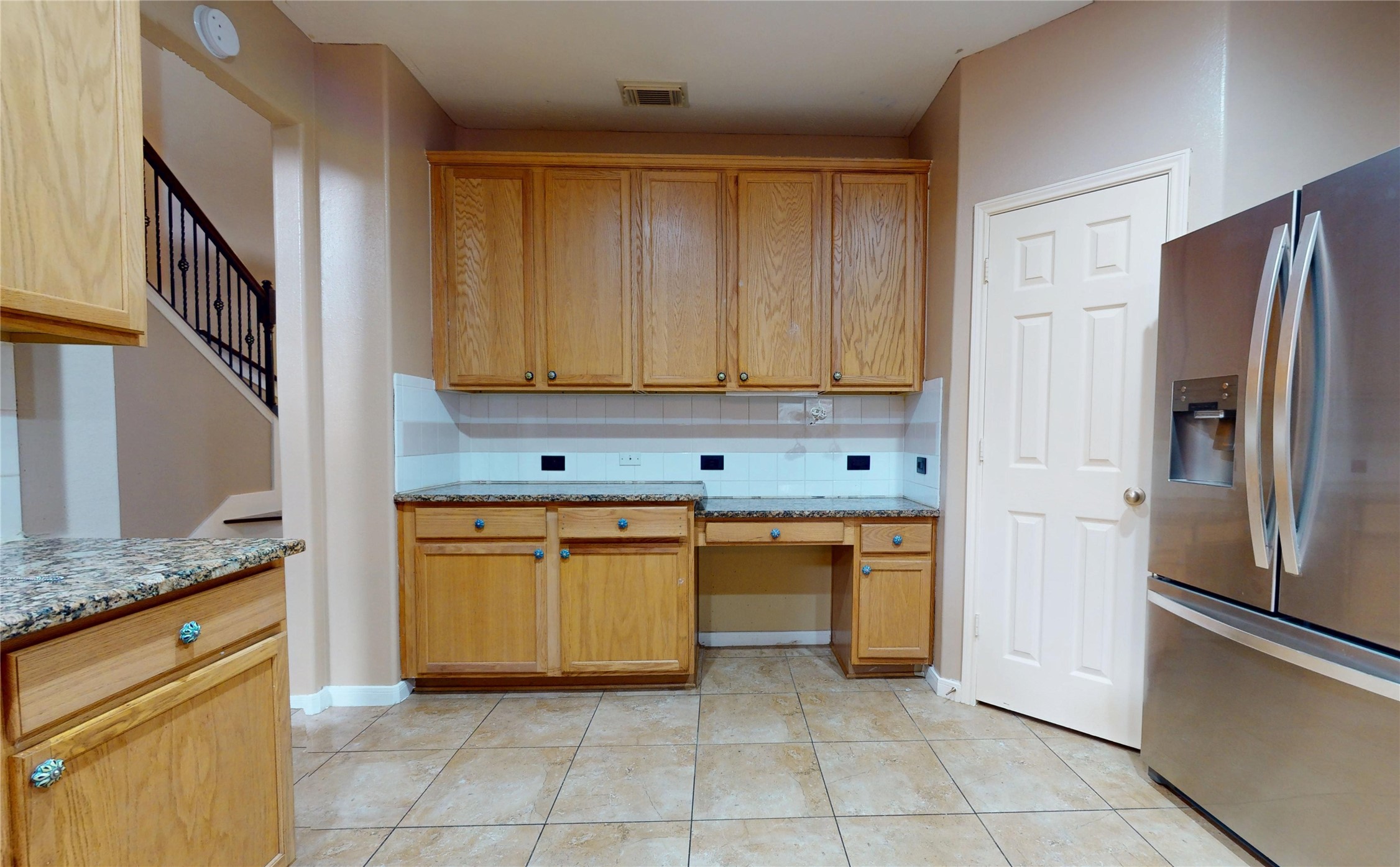 21050 Florette Lane Spring, TX 77388 - Photo 15 of 50 a kitchen with stainless steel appliances granite countertop a refrigerator and a sink