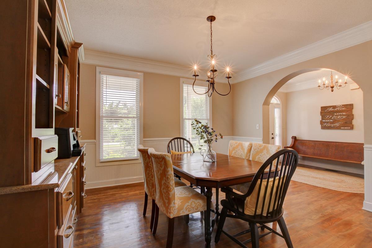 730 Dixie Bee Road Clarksville, TN 37043 - Photo 13 of 30 a view of a dining room with furniture window and wooden floor