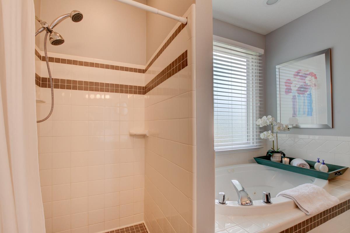 730 Dixie Bee Road Clarksville, TN 37043 - Photo 17 of 30 a bathroom with a sink and a mirror