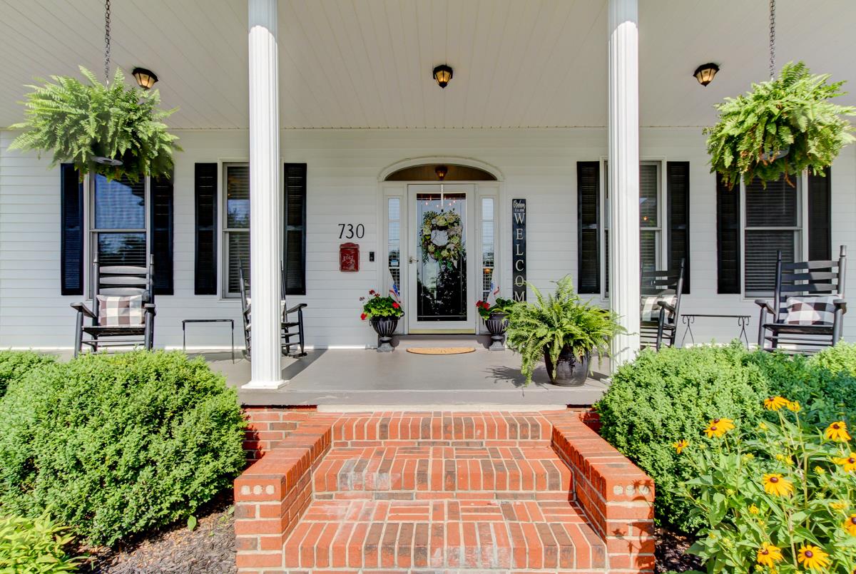 730 Dixie Bee Road Clarksville, TN 37043 - Photo 2 of 30 a front view of a house with lots of green space