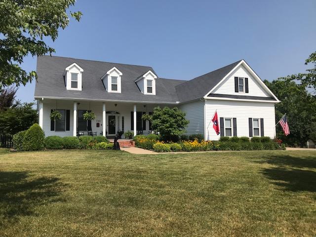 730 Dixie Bee Road Clarksville, TN 37043 - Photo 30 of 30 a front view of a house with a yard and garage