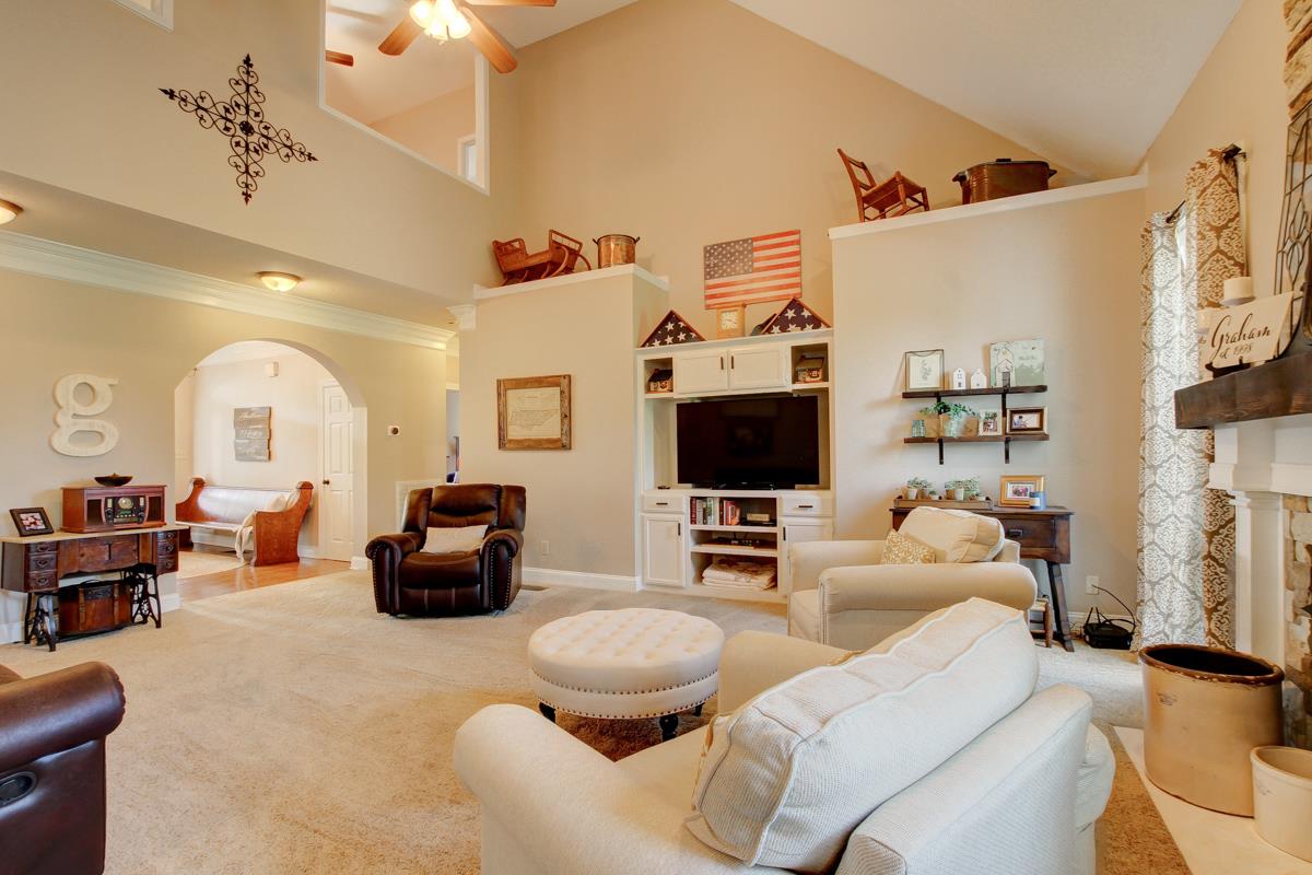 730 Dixie Bee Road Clarksville, TN 37043 - Photo 7 of 30 a living room with furniture and a flat screen tv