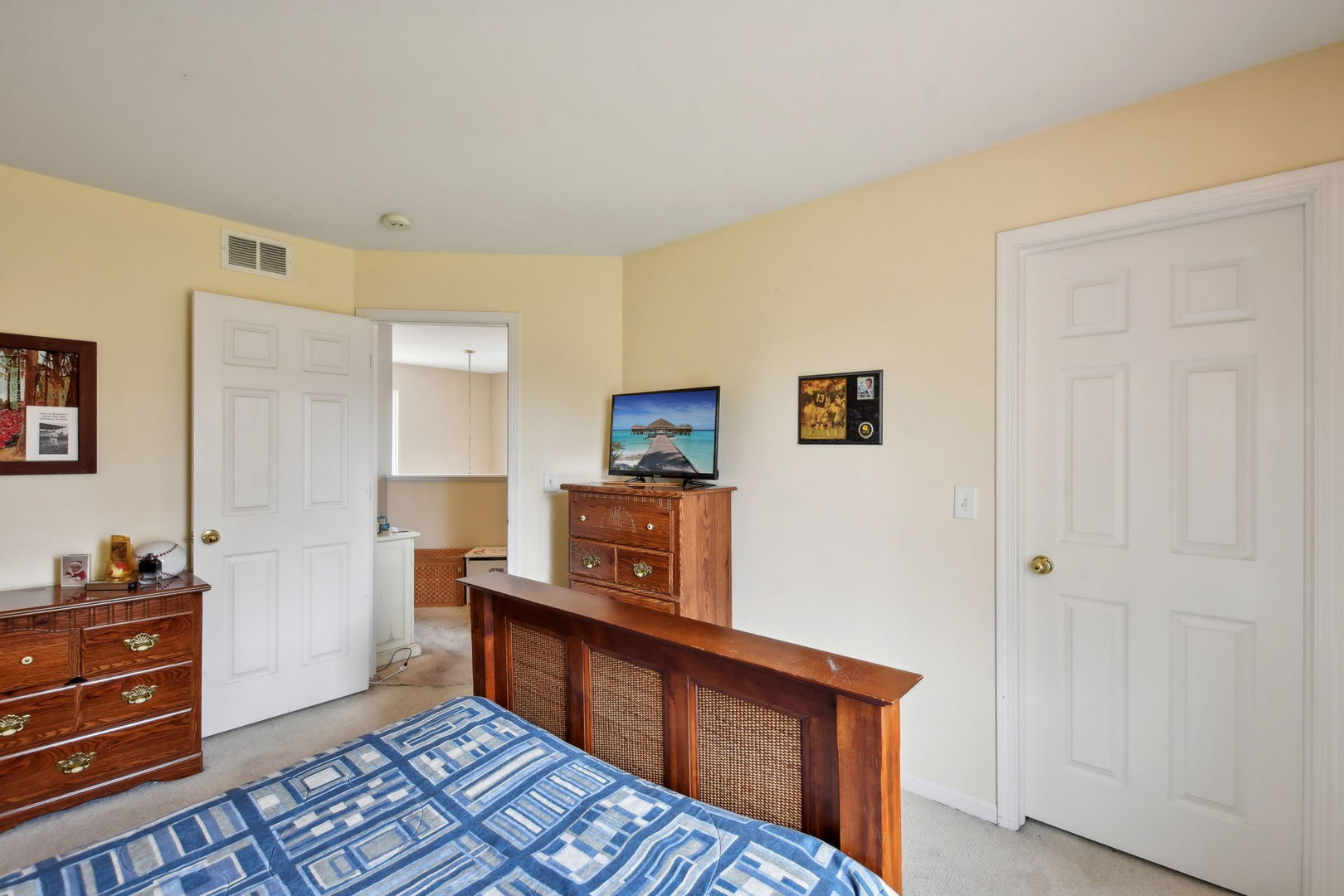 2673 Rourke Drive Aurora, IL 60503 - Photo 20 of 37 a view of a bedroom with furniture and wooden floor