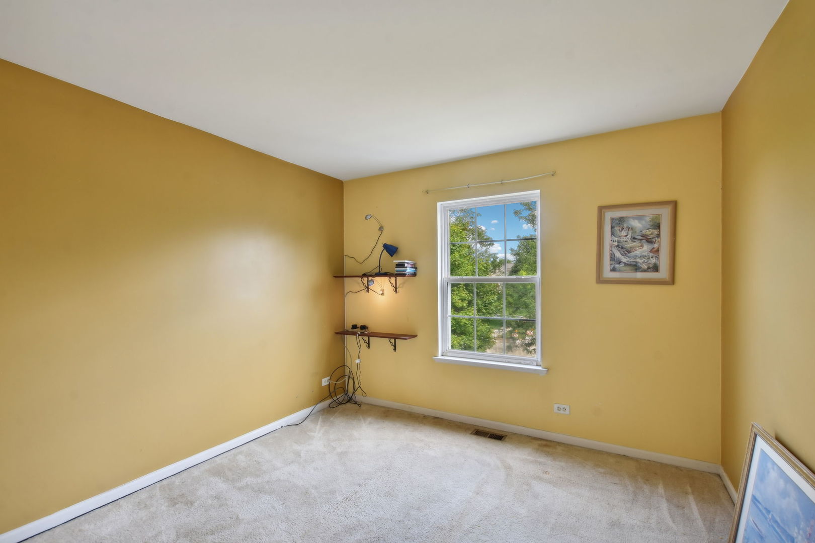 2673 Rourke Drive Aurora, IL 60503 - Photo 21 of 37 a view of a big room with wooden floor and windows