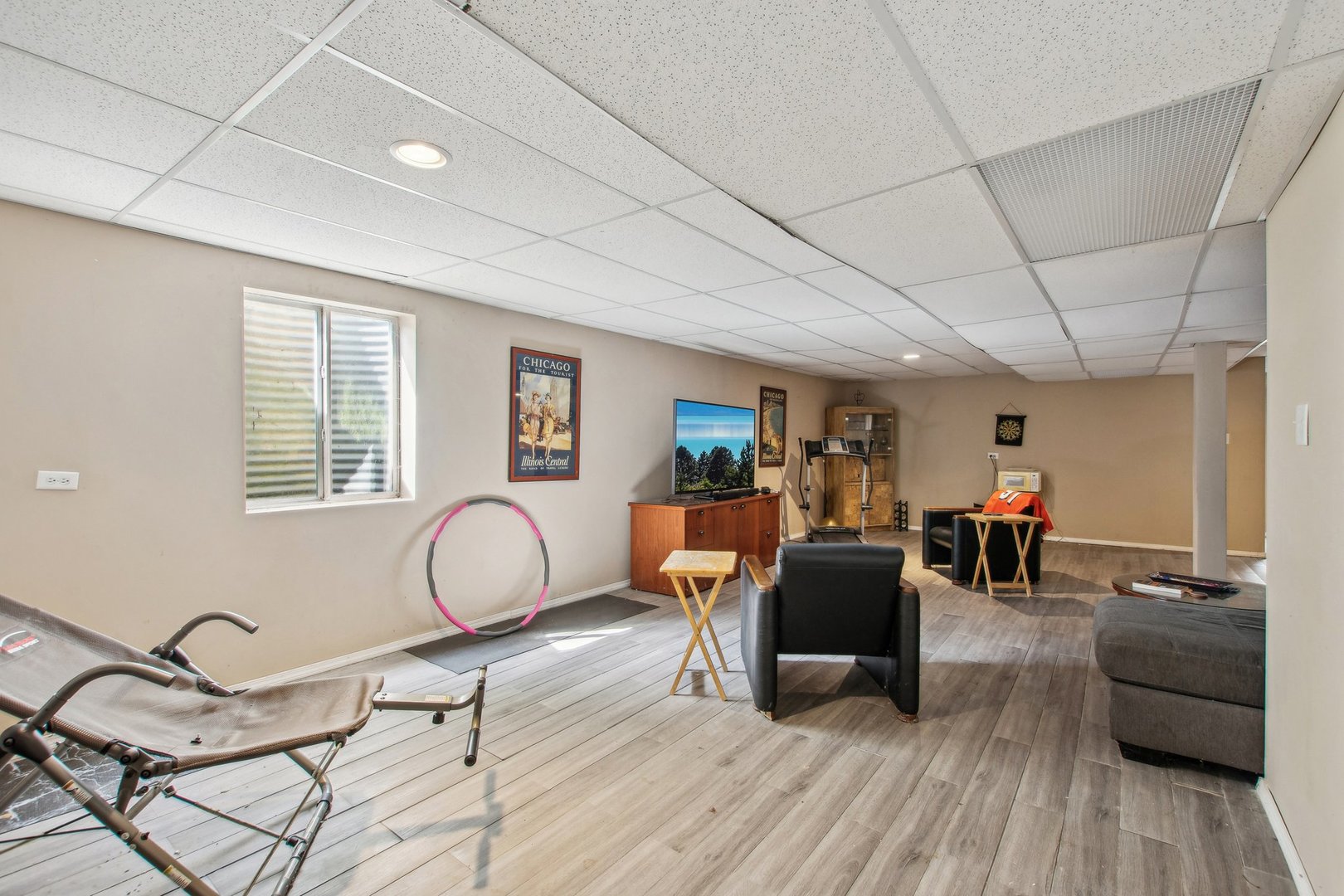 2673 Rourke Drive Aurora, IL 60503 - Photo 26 of 37 a living room with furniture and wooden floor