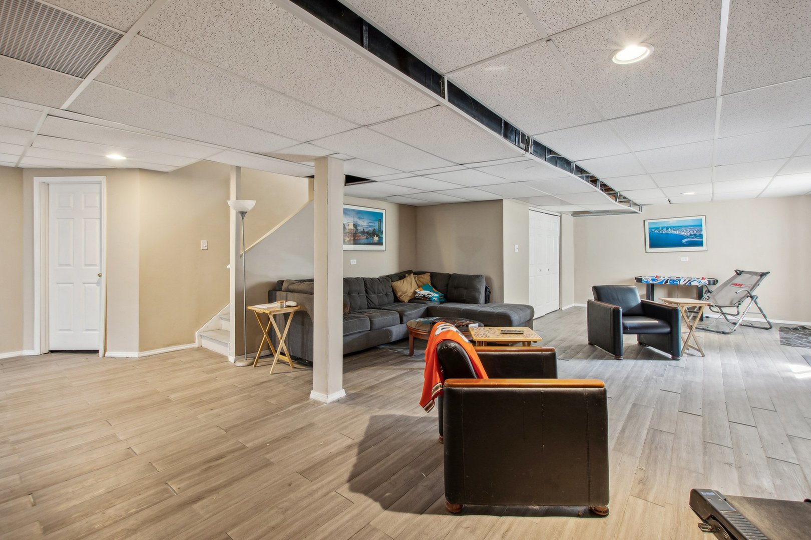 2673 Rourke Drive Aurora, IL 60503 - Photo 27 of 37 a living room with furniture and a flat screen tv