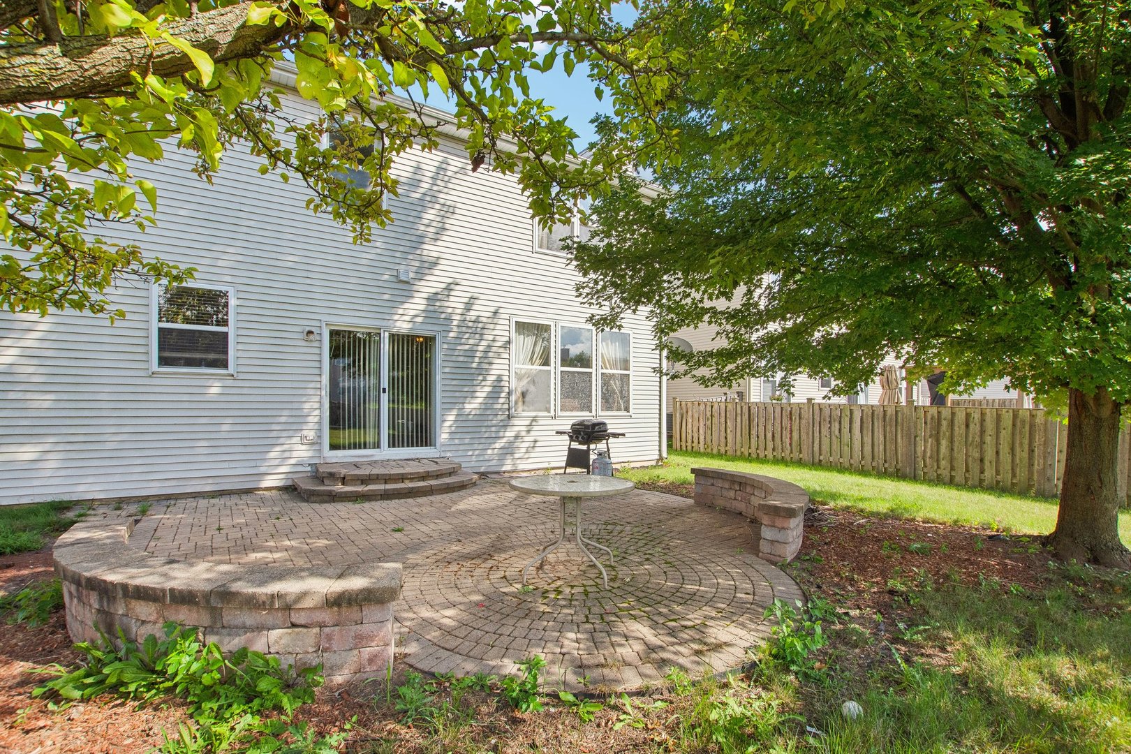 2673 Rourke Drive Aurora, IL 60503 - Photo 29 of 37 a view of a house with backyard and wooden fence