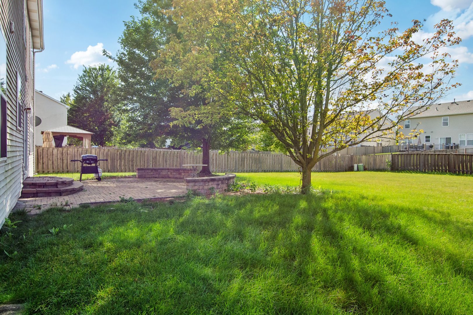 2673 Rourke Drive Aurora, IL 60503 - Photo 30 of 37 a view of backyard with swimming pool