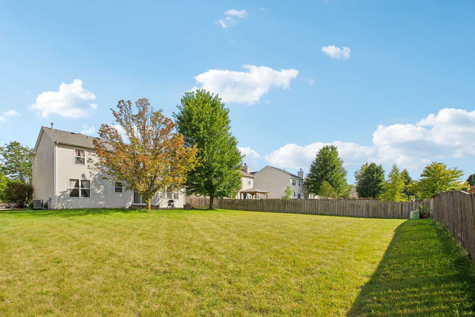 2673 Rourke Drive Aurora, IL 60503 - Photo 34 of 37 a view of yard with swimming pool and green space