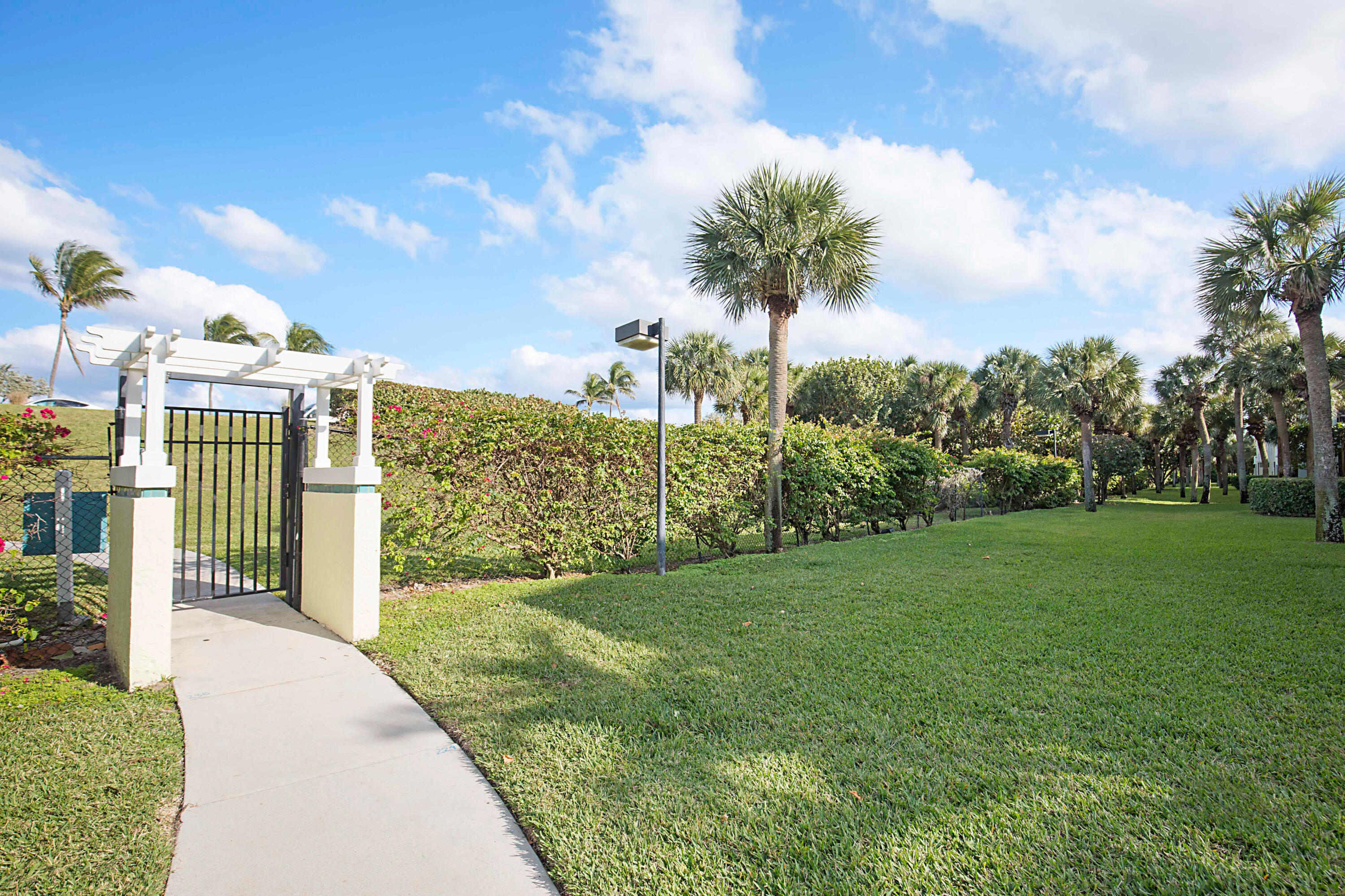 202 Mainsail Circle Jupiter, FL 33477 - Photo 30 of 35 Gate to beach