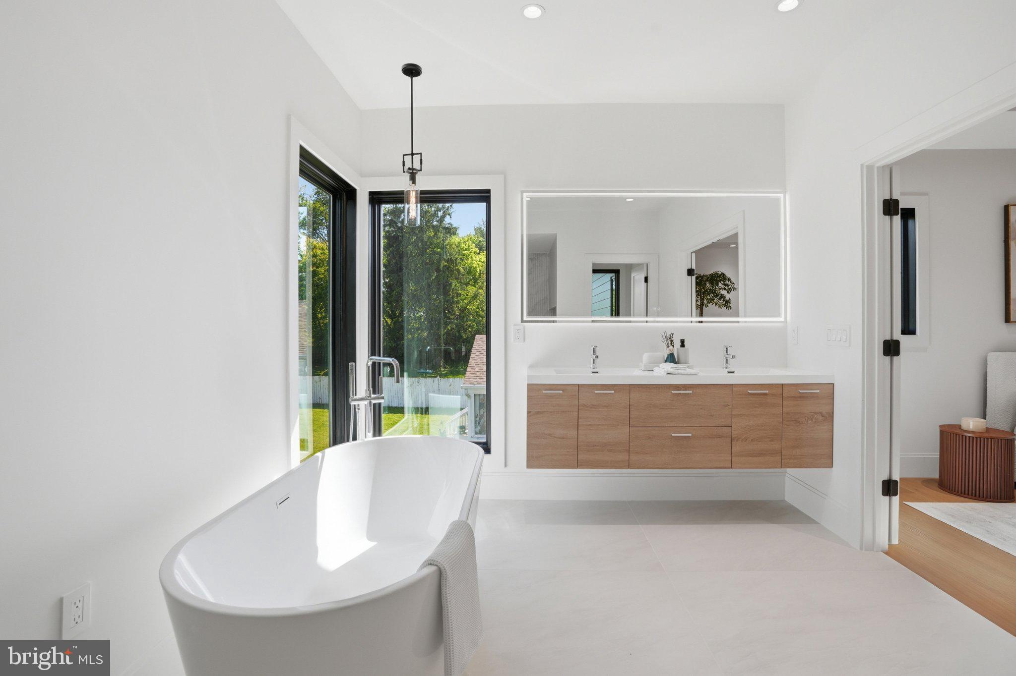 7421 Magarity Road Falls Church, VA 22043 - Photo 52 of 66 Serene modern bathroom oasis.