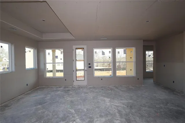 a view of an empty room with window