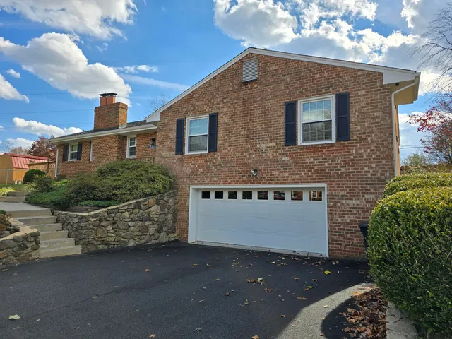 a front view of a house with windows