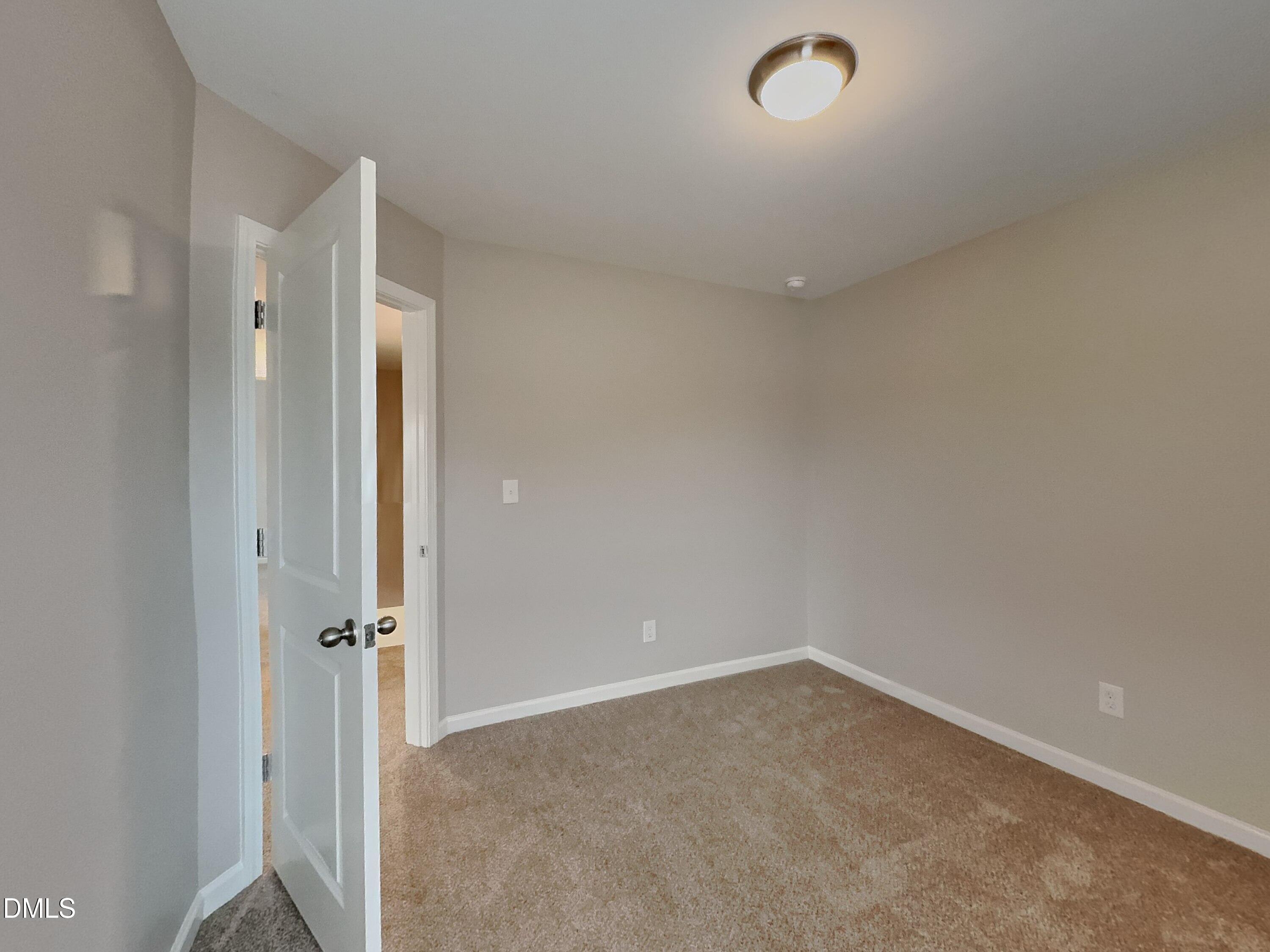 803 Springtooth Drive Zebulon, NC 27597 - Photo 10 of 16 a view of an empty room