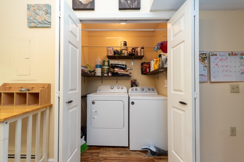 40 Nashua Street, Unit 5 Clinton, MA 01510 - Photo 13 of 33 a view of storage and utility room with washer and dryer