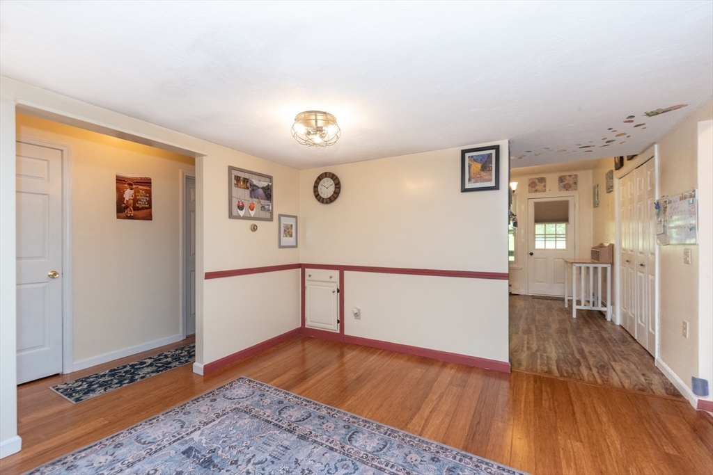 40 Nashua Street, Unit 5 Clinton, MA 01510 - Photo 14 of 33 a view of a hallway with wooden floor
