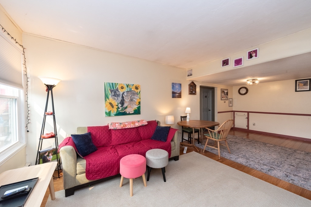 40 Nashua Street, Unit 5 Clinton, MA 01510 - Photo 15 of 33 a living room with furniture and a large window