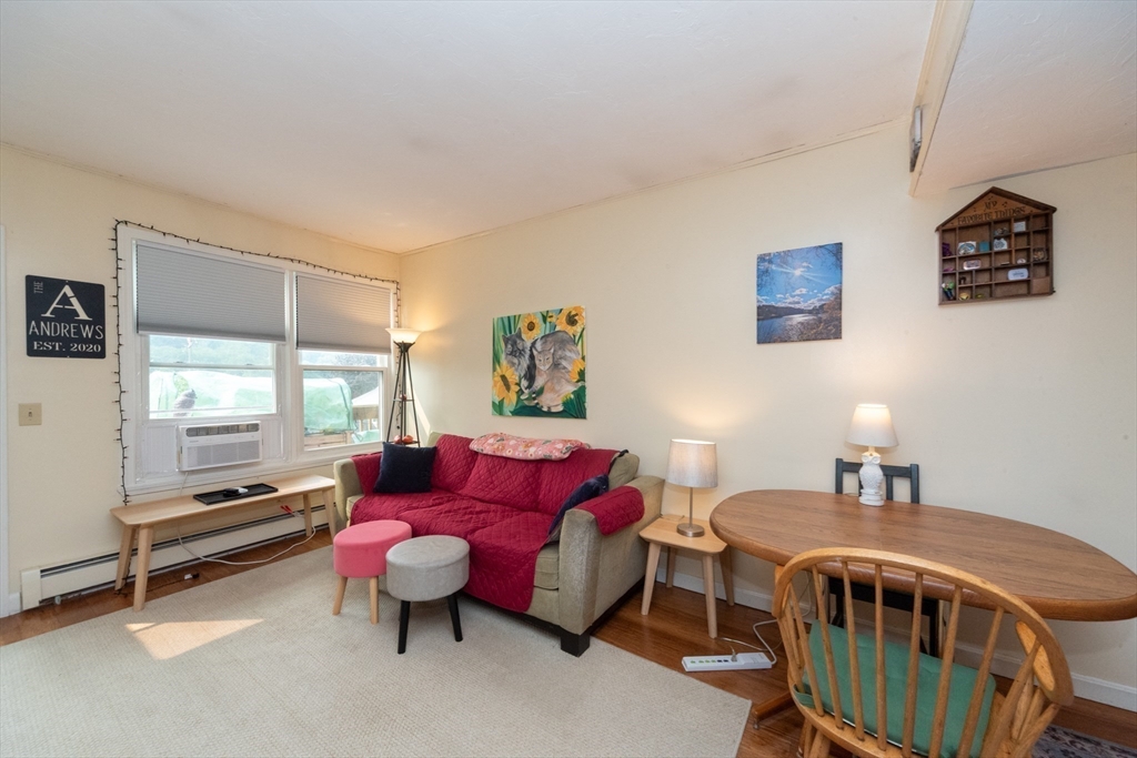 40 Nashua Street, Unit 5 Clinton, MA 01510 - Photo 16 of 33 a bedroom with a bed and a window