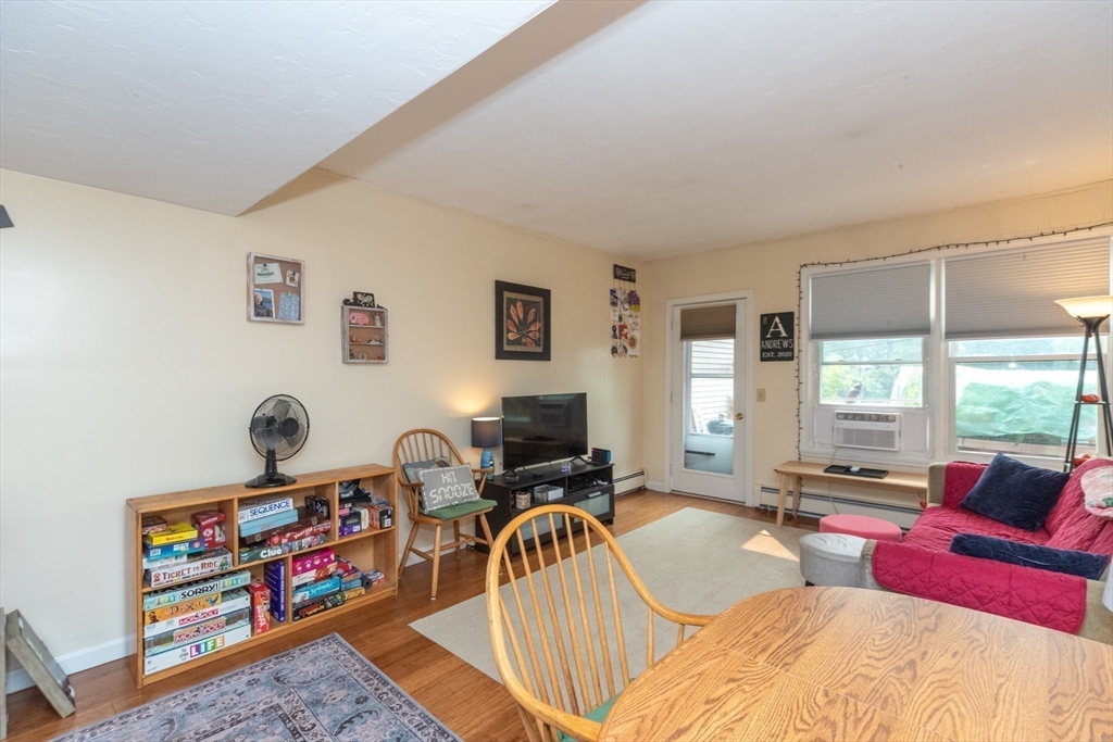 40 Nashua Street, Unit 5 Clinton, MA 01510 - Photo 18 of 33 a bedroom with furniture and a window