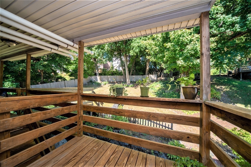 40 Nashua Street, Unit 5 Clinton, MA 01510 - Photo 28 of 33 a view of a wooden deck with a yard