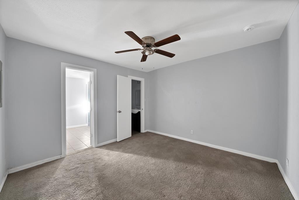 809 Hackamore Street White Settlement, TX 76108 - Photo 11 of 21 a view of a ceiling fan in a room