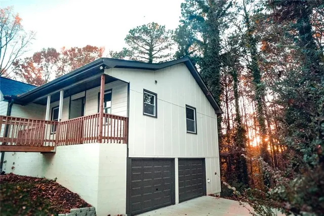a front view of a house with garage