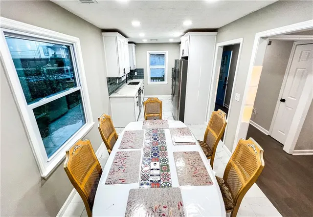 view of living room with wooden floor washer and dryer