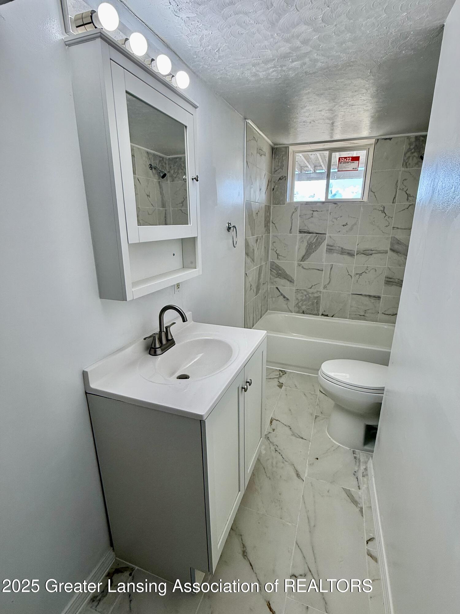 9575 West Monroe Road Elwell, MI 48832 - Photo 14 of 60 Main floor bath