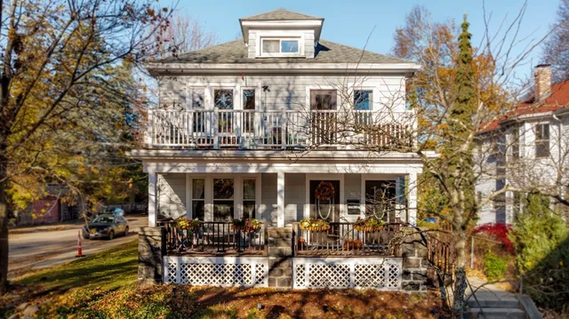 a front view of a house with swimming pool