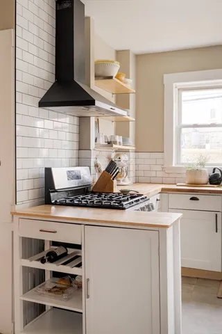 a dining room with table and hallway