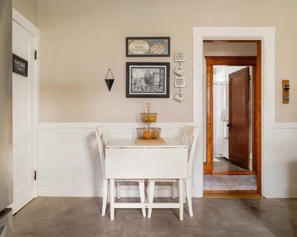 a kitchen with a stove and cabinets