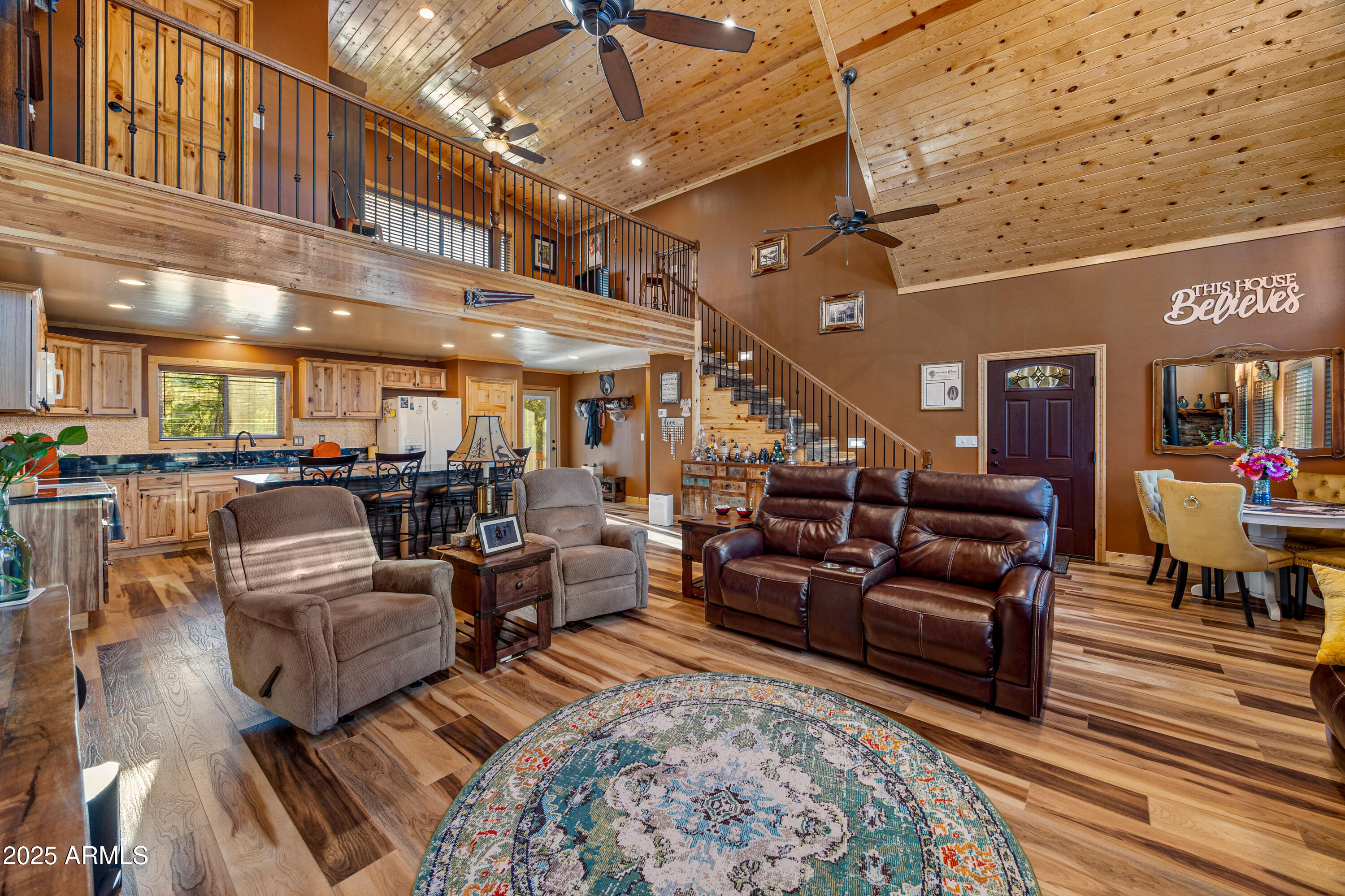 3334 Sawmill Ridge Loop Heber, AZ 85928 - Photo 10 of 58 a living room with furniture and wooden floor