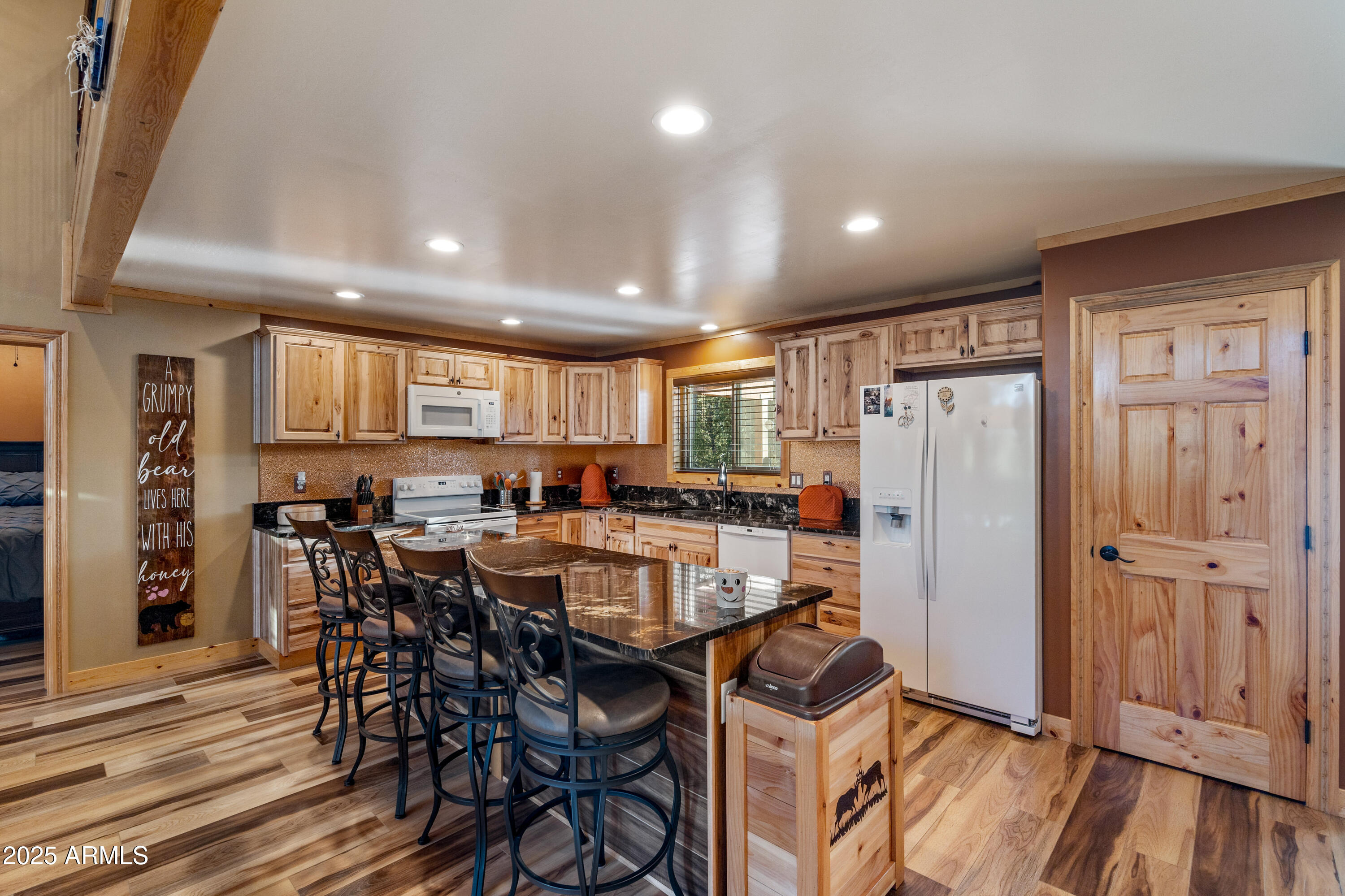 3334 Sawmill Ridge Loop Heber, AZ 85928 - Photo 12 of 58 a view of a dining area with furniture window and wooden floor