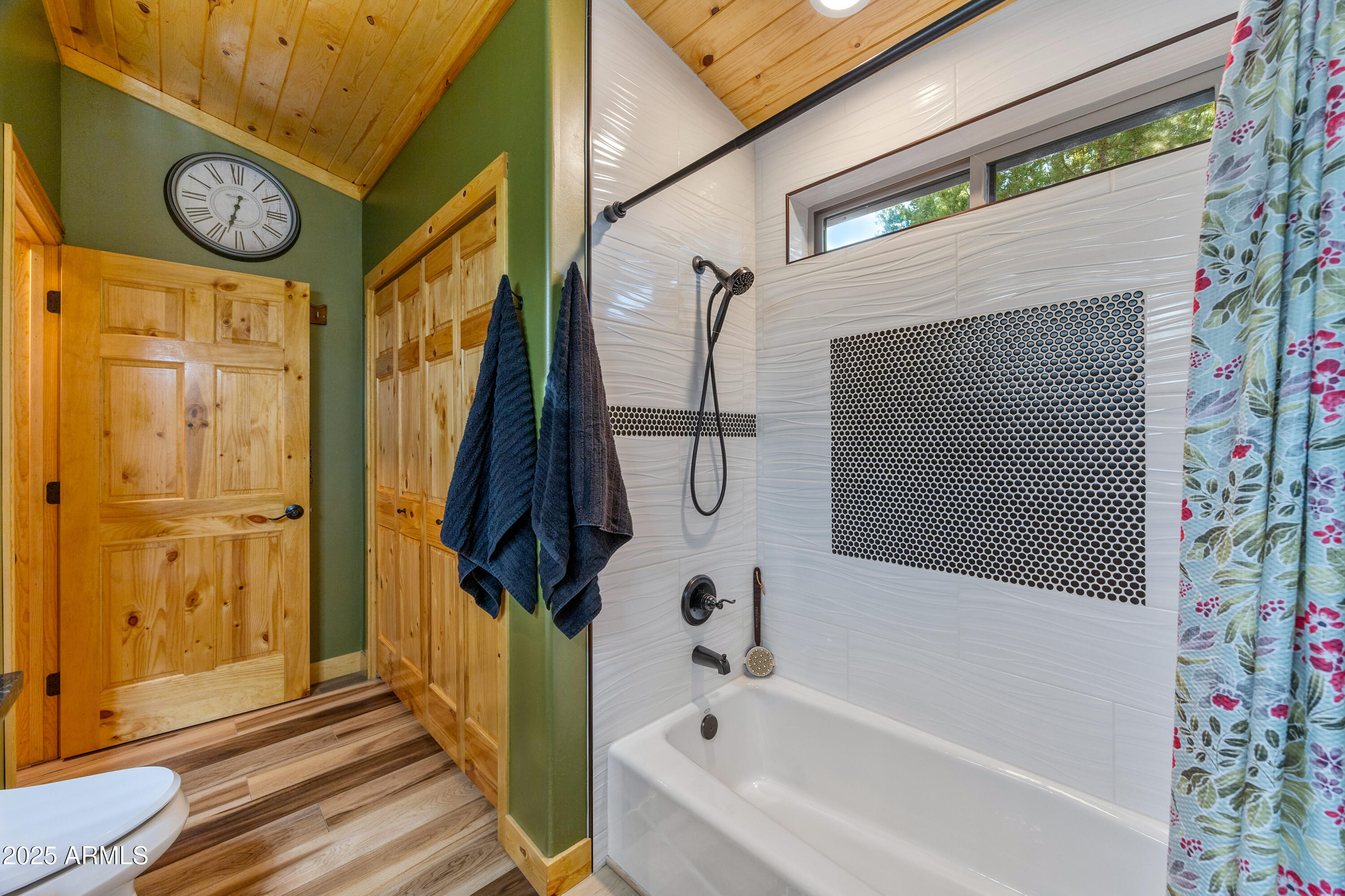 3334 Sawmill Ridge Loop Heber, AZ 85928 - Photo 21 of 58 a bathroom with a bathtub and shower
