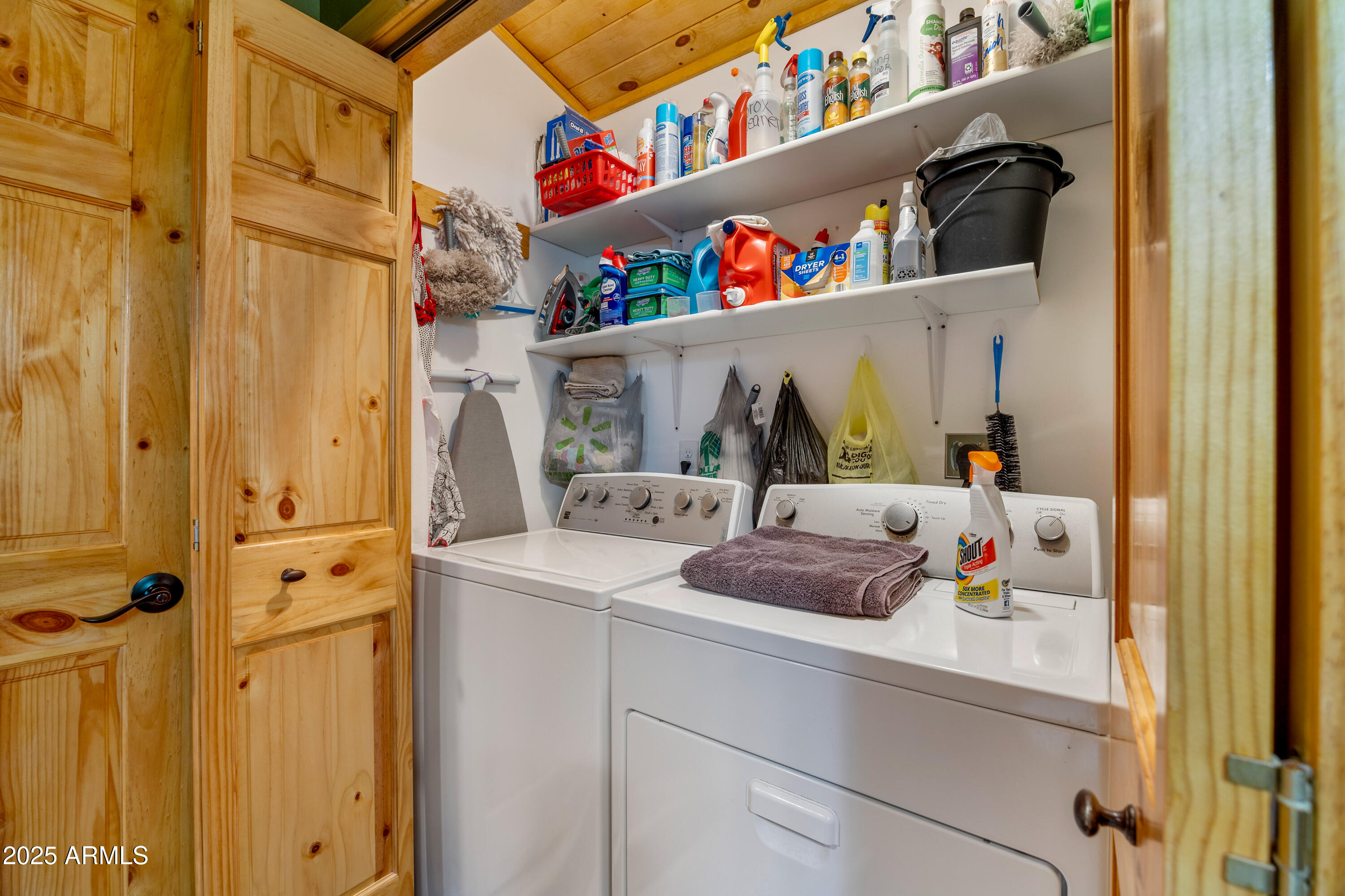 3334 Sawmill Ridge Loop Heber, AZ 85928 - Photo 26 of 58 a bathroom with a sink and a shower curtain