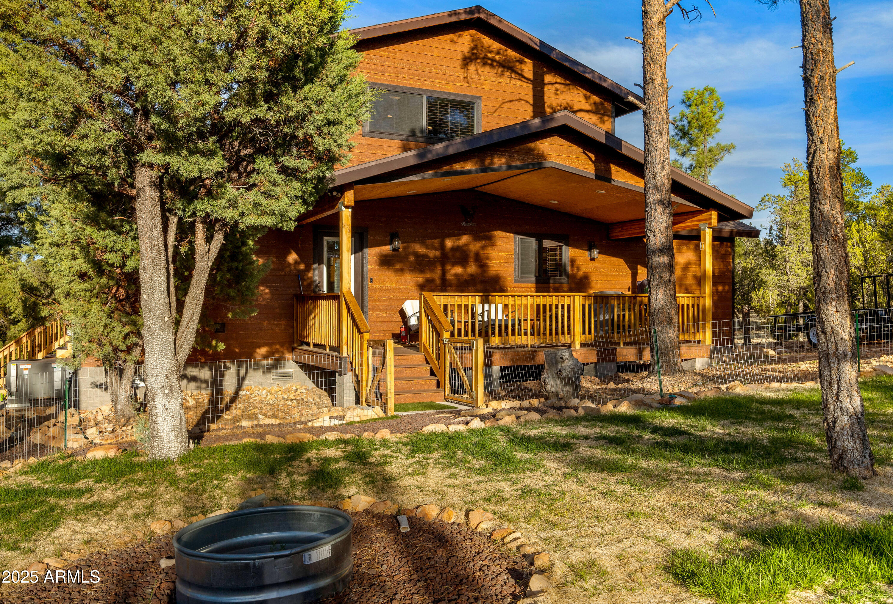3334 Sawmill Ridge Loop Heber, AZ 85928 - Photo 29 of 58 a view of a house with a yard