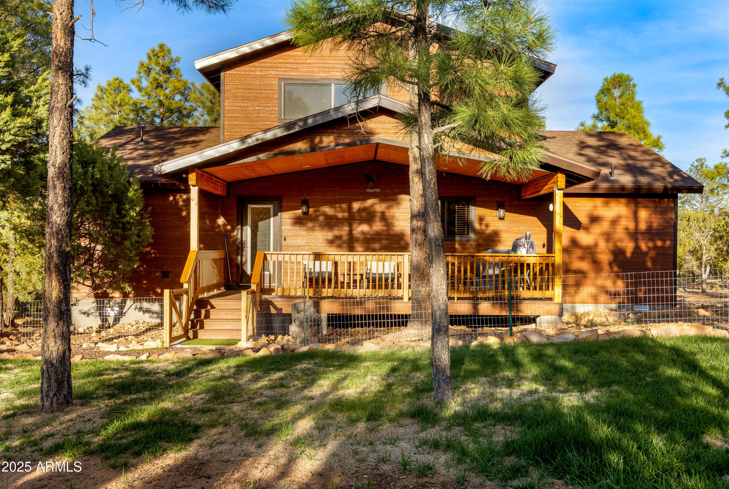 3334 Sawmill Ridge Loop Heber, AZ 85928 - Photo 30 of 58 a view of a house with a small yard