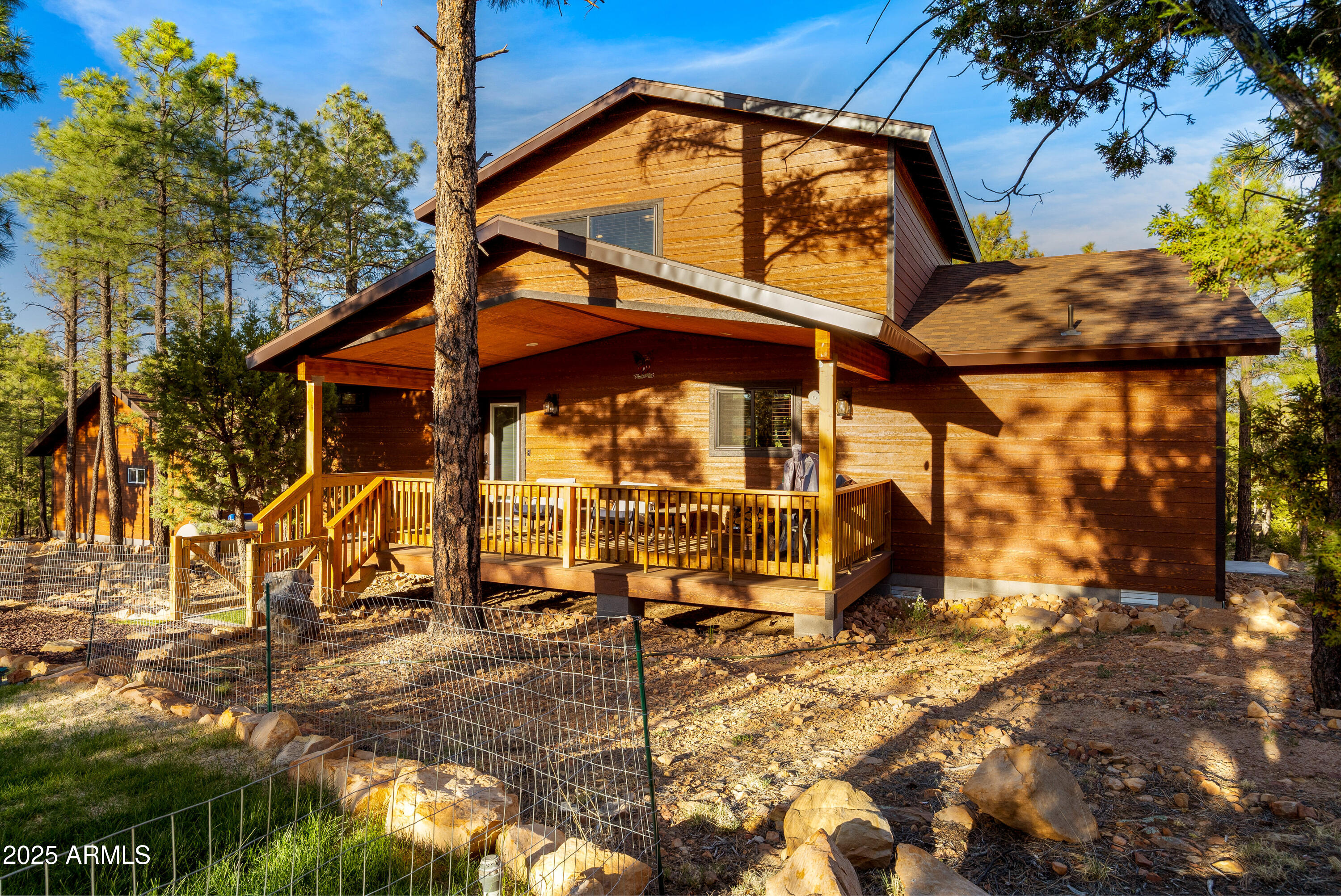 3334 Sawmill Ridge Loop Heber, AZ 85928 - Photo 31 of 58 a view of a house with backyard