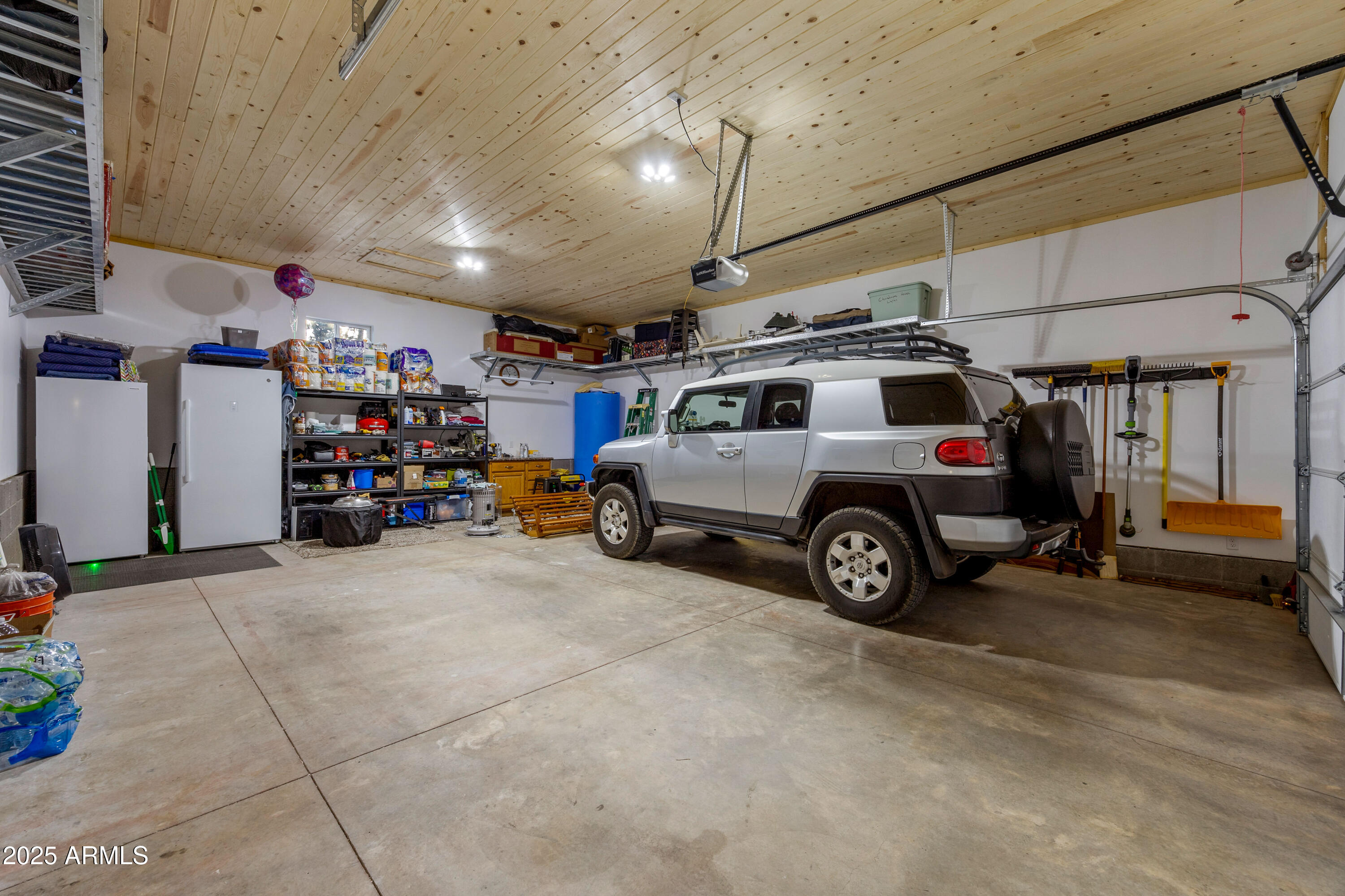 3334 Sawmill Ridge Loop Heber, AZ 85928 - Photo 34 of 58 a view of parking garage with cars
