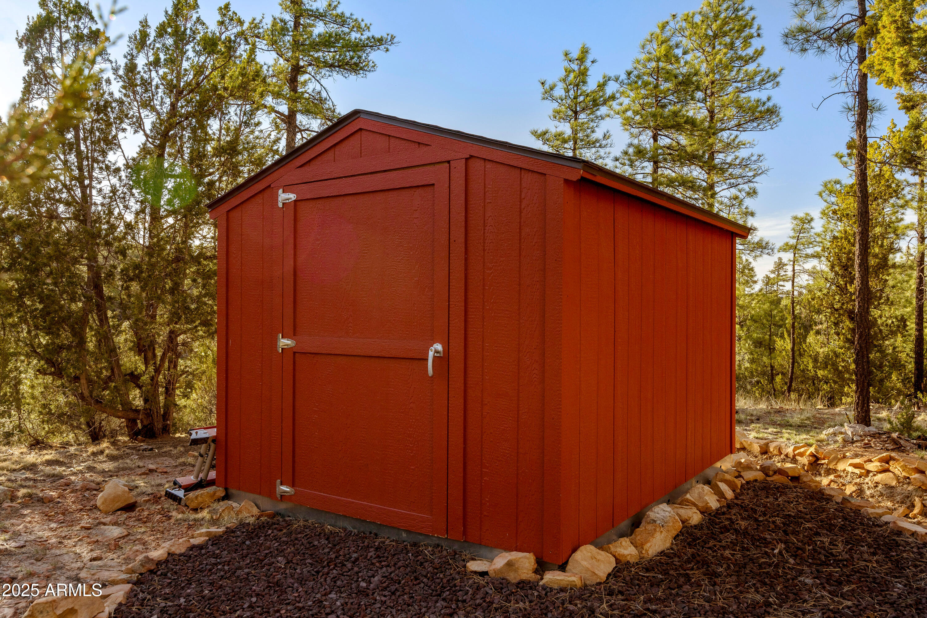 3334 Sawmill Ridge Loop Heber, AZ 85928 - Photo 35 of 58 a backyard of a house