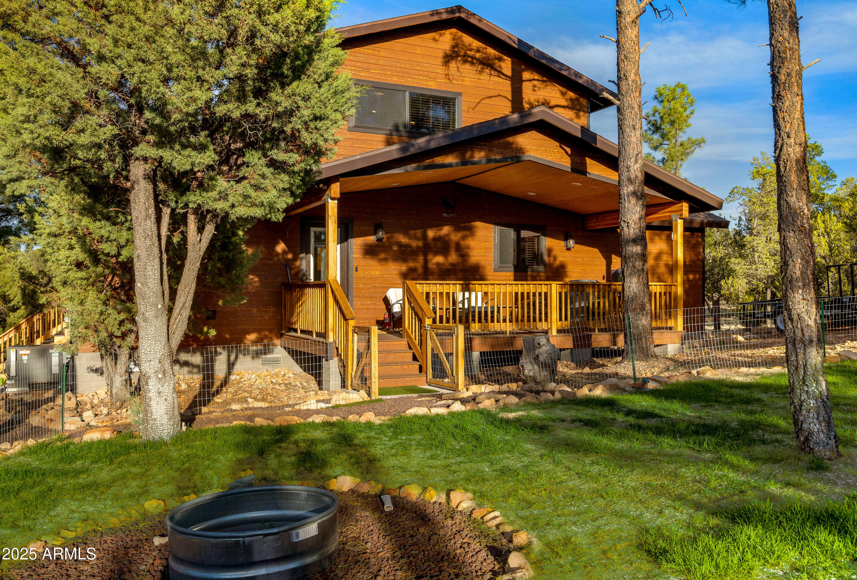 3334 Sawmill Ridge Loop Heber, AZ 85928 - Photo 42 of 58 a view of a house with a yard