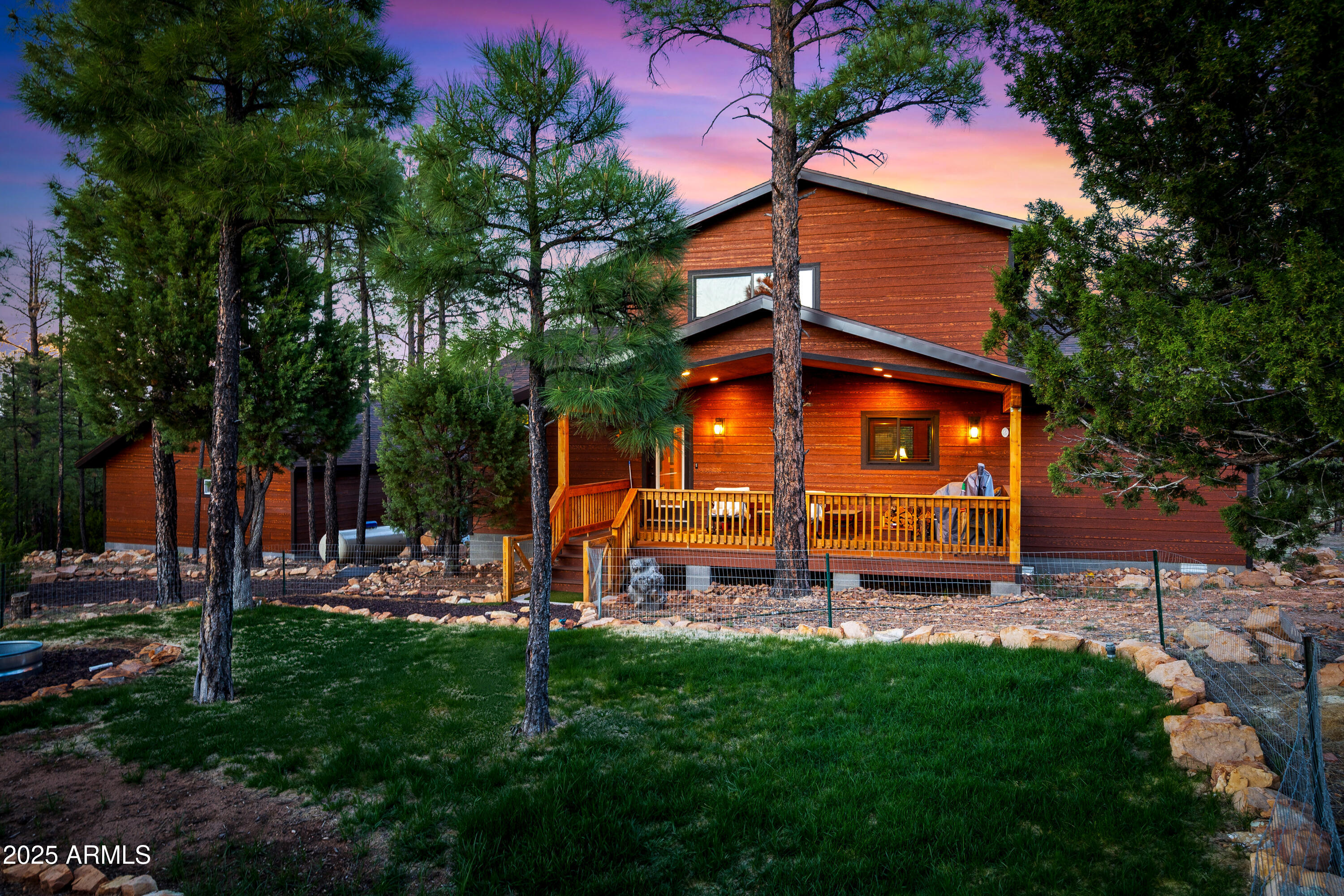 3334 Sawmill Ridge Loop Heber, AZ 85928 - Photo 3 of 58 a view of a house with backyard and sitting area